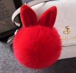 Pehme k&uuml;&uuml;likuk&otilde;rva kunstkarusnahk PomPom palliga telefonikott Rippuv ripats k&auml;ekott v&otilde;tmehoidja punane