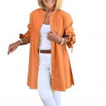 Naiste s&auml;rk, p&uuml;kskraega, pikkade varrukatega, paeltega, mansettidega, n&ouml;&ouml;pidega, nipsas&auml;rgiga, &uuml;hev&auml;rviline, lahtise l&otilde;ikega, keskmise pikkusega s&auml;rk M oranž