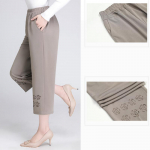 Keskealiste ja vanade naiste suvep&uuml;ksid &otilde;hukesed elastsed v&ouml;&ouml;kohad lahtised vabaaja p&uuml;ksid, ema riided p&uuml;ksid 4XL khaki