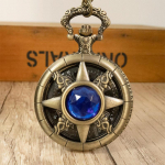 Uus pronkskvartsist &otilde;&otilde;nes inkrusteeritud poolringikujulise ereda kiviga t&auml;histaevaga Literal roheline iidne taskukell