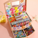 iF ME 860 tk dopamiinist moodne naiste elastse peapaela komplekt, mis sisaldab vibu, lille- ja t&auml;heklambreid, peapaela ja kummipaela ilma karbita