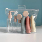 11 tk reisipudelite komplekt koos s&auml;ilituskotiga Reisisuurus T&uuml;hjad Vedela Kreemi Lotion Mahutid Peene udu pihustuspudeli pigistamistorud 11PCS