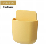 Seinale paigaldatav kaugjuhtimispuldi ja telefoni salvestuskarp: Puntsivaba abivahend elutuppa v&otilde;i voodi k&otilde;rvale. 400/box kollane/loojang