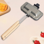 Kahepoolne k&otilde;rge temperatuurikindel v&otilde;ileivapann pika k&auml;epidemega lihtsaks hommikus&ouml;&ouml;giks ja r&ouml;stimiseks Poland