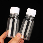 5 tk 60 ml v&auml;ikesed plastpudelid korgiga ingveripudelid minimahlapudelid korduvkasutatavad vedelikupudelid lekkekindlad