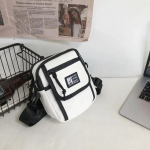 Mehed, naised, &uuml;li&otilde;pilaste l&otilde;uendist &otilde;lakott T&auml;nava v&auml;ike s&otilde;numikott &uuml;li&otilde;pilastele Korea Harajuku Unisex Crossbody kotid Telefoni rahakotid