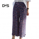 Naiste p&uuml;ksid, elastsed k&otilde;rge v&ouml;&ouml;kohaga p&uuml;ksid, laia s&auml;&auml;rega p&uuml;ksid, lilledega tr&uuml;kitud, drapeeritud plisseeritud pikad p&uuml;ksid. roheline