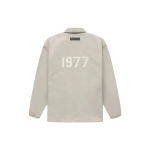 Fear of God Essentials 1977 Seeria FW22 Nailonist treeningjakk &uuml;hev&auml;rvilise logoga ja tuulekindlate n&ouml;&ouml;pidega Unisex &Uuml;ler&otilde;ivad Suitsuhall FOG-FW22-999 XS