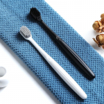 Uus Jaapani mustvalge spiraalharjastega hambahari &ndash; t&auml;iskasvanute &uuml;ksikpakk, suur pea valge