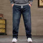 Eriti suurte m&otilde;&otilde;tudega teksap&uuml;ksid meestele K&otilde;rge elastne v&ouml;&ouml;koht Kottis denimp&uuml;ksid Meeste Pluss suurused Lahtised Slim Fit Cowboy p&uuml;ksid 8XL Klassikaline 4XL sinine