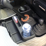 Keskkonsooli k&auml;etoe karbi alus tassihoidjaga Toyota Land Cruiser 70 71 76 79 jaoks