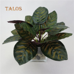 1 tk kunsttaime troopilised paabulinnu lehed isetehtud lilleseadete kaunistamiseks