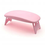 Kokkupandav k&uuml;&uuml;nte manik&uuml;&uuml;ri tugi k&auml;sivarre alus padi padjahoidja Laud kirjutuslaud k&auml;etugi k&auml;sn tugimatt poleerimisriistade praktikasalong roosa