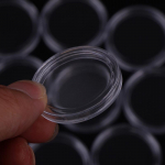10 tk 32 mm plastikust &uuml;mmargused l&auml;bipaistvad &uuml;mbrised m&uuml;ndi hoiukapslite hoidik One Size