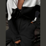 Sport kapuutsiga t&otilde;mblukuga kontrastsed kombinesoonid naiste p&otilde;hjuslikud t&auml;isvarrukatega taskud, k&otilde;rge v&ouml;&ouml;kohaga p&uuml;ksid, vedrud lahtised sirged p&uuml;ksid S must