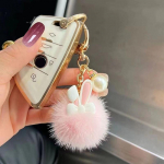 Multifilm K&uuml;&uuml;liku karusnahast palli v&otilde;tmehoidja Pehme armas karvane j&auml;nese nukud kott v&otilde;lusid loomad auto v&otilde;tmehoidja koti kaunistused valge