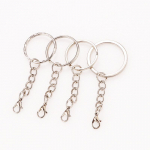 K&auml;sitsi valmistatud DIY metallist v&otilde;tmehoidja homaari lukuga keti ripatsiga 25mm Embossed Ring with Lobster Clasp