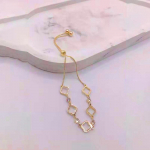 Neljaleheline murust t&otilde;mbav k&auml;ev&otilde;ru, naiste titaanterasest t&auml;iustatud roosakuldne k&auml;ev&otilde;ru