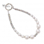 Mobiiltelefoni randmepael helmestega Faux Pearl Charm vargusvastane telefonipael Moodne k&auml;ed-vabad k&auml;ev&otilde;ru Rhinestone telefonirihm A