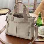 Praktiline l&otilde;uendist kandekott naistele, multifunktsionaalne lukuga crossbody kott, &otilde;pilase vabaaja k&auml;ekott, disainerkott khaki