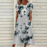 Suvine uus plusssuuruses naiste tr&uuml;kitud kleit &uuml;mmarguse kaelusega vintage printiga lilleline avar kleit naiste elegantne mood puhkuseks &otilde;huke pikk taskutega kleit 26376 S