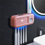 Ultraviolett intelligentse steriliseerimisega hambaharja hoidik UV-valgusega steriliseerija hambapasta dosaator Seinale paigaldatav hambapasta pressimismasin USB & Solar Powered valge