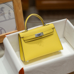 Teise p&otilde;lvkonna peopesamustriga nahast kott, minikrossikott, moekas lehmanahast naiste kott, &otilde;lakott, k&auml;ekott 19x12x5.5cm h&otilde;be/kollane