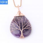 Suur roosa kulla v&auml;rvi veetilga kujuline keerduv ripatskaelakee, naturaalse kristalli ripatskaelakee, puhas k&auml;sit&ouml;&ouml;, elupuu amethyst