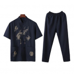 2 tk / komplekt Keskmise vanusega vabaaja &uuml;likond Hiina stiilis draakoni mustriga aluskrae l&uuml;hikeste varrukatega &uuml;herealised topid elastne v&ouml;&ouml;koht pikkade p&uuml;kste komplekt M kollane