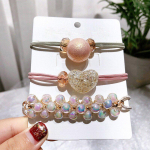 3 tk/partii p&auml;rlhelmed Kristall-elastsed juuksepaelad t&uuml;drukutele hobusesabahoidja kummist juuksen&ouml;&ouml;rid naiste juukseaksessuaarid lilla