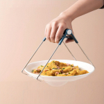 1 tk silikoonk&auml;epidemega k&ouml;&ouml;gitangid: P&otilde;lemisvastane klamber kuumade kausside, pottide, taldrikute ja muu jaoks! 1pc