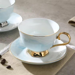 P&otilde;hjamaade stiilis marmorist kohvitass ja taldrik Kaheosaline v&auml;rvitud kullaga keraamilise tassi komplekt veetass Lilletee tass piimatass