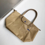 Uus disainkott nailonist naiste k&auml;ekotid logoga Dumpling Beach Bag Luksuslikud kaubam&auml;rgiga ostukotid nahast k&auml;epidemega kandekotid L 31cm