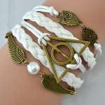 1 tk Surma v&auml;gisi retro-nahast n&ouml;&ouml;rist k&auml;ev&otilde;ru Kuldsed tiivad lendava varga kolmnurga k&auml;ev&otilde;ru pruun