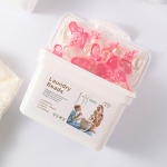 Kolm-&uuml;hes karbis olevad pesuhelmed l&otilde;hnahelmestega Kauakestvad l&otilde;hnaga pesuhelmed Pehme ja lesta eemaldav mitmetoimeline pesupesemisvahend