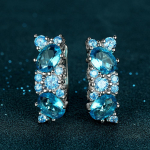 Geomeetria naiste h&otilde;bedane &uuml;mmargune ovaalne l&otilde;ikega vesisinine kivist k&otilde;rvar&otilde;ngad naistele CZ k&otilde;rvaklambritega aastap&auml;eva kingitus merelaine