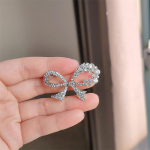 Jaapan ja L&otilde;una-Korea K&otilde;rgekvaliteediline v&auml;ike vibu pross Naiste mitmek&uuml;lgne kardigan korsaaksessuaarid Lihtsad valgustusvastased fikseeritud riided