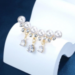 Elegantsed valgetest p&auml;rlitest prossid naistele t&uuml;drukutele luksuslikud kullav&auml;rvi vesipiiskade tuttide prossid