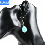 Euroopa ja Ameerika Water Drop Fashion Fishhook naiste k&otilde;rvar&otilde;ngad Looduslikud poolv&auml;&auml;riskivid kristallid Lihtsad k&otilde;rvar&otilde;ngad turquoise green