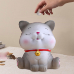 Kassi kujuke kuju notsu pangahoidla loomaskulptuur kogumisobjektide s&auml;ilituspudelifestivali kingituste s&auml;&auml;stupott eyes closed