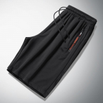 Ice Silk vabaaja l&uuml;hikesed p&uuml;ksid Meeste konditsioneeriga p&uuml;ksid Suured elastsed p&uuml;ksid Sport Capris kiiresti kuivavad p&uuml;ksid 9XL