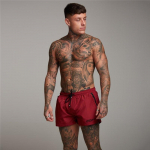 Muscleguys meeste mustriga &otilde;hukesed rannap&uuml;ksid hingavad ja higi t&otilde;rjuvad pol&uuml;estrist dressipluusid j&otilde;usaali fitness l&uuml;hikesed p&uuml;ksid Kulturismi elastne v&ouml;&ouml;koht M must