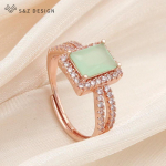 Trendikas luksuslik ristk&uuml;likukujuline kristallist muudetava suurusega s&otilde;rmused naistele pulmapeo moe roosikulla v&auml;rvi kuupmeetri tsirkooniumoksiidist ehtekink