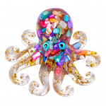 Kaheksajala kujukeste vaigust valmistatud kaheksajala ornament, t&auml;idetud kristallkruusatega lauaplaat, tervendav kristall-kaheksajala kuju vitriinkapi kontorilauale