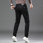 Kevad ja s&uuml;gis Puhtalt mustad meeste k&otilde;rgekvaliteedilised teksad Slim Fit sirge s&auml;&auml;rega Elastsed vabaaja pikad p&uuml;ksid Trend 28 must