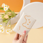 Naiste rahakott Kolmekordne mitmekihiline kompaktne m&uuml;ndikott, nahast tekstuur, armas loomade tr&uuml;kisega &otilde;pilaste kaasaskantav rahakott must