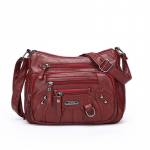 Naiste pehmest nahast mitme sahtliga mitme taskuga &otilde;mmeldud &uuml;he &otilde;laga k&auml;ekott veini