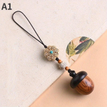 Sandlipuust tammet&otilde;ruga autov&otilde;tmehoidja ripats, m&auml;nnik&auml;bist telefonikett, saab lahti keerata nii meeste kui ka naiste aksessuaaride jaoks A1