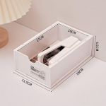 Lauaarvuti mitmekihiline kirjatarvete riiul, mis lisab &uuml;li&otilde;pilas&uuml;hiselamutele k&otilde;rghooneid, raamatute organiseerimine ja kosmeetika hoiustamine