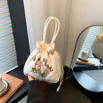 Retrotikandiga pingutusn&ouml;&ouml;rikott Lillemustriga &auml;mbrikott Naiste mood k&auml;ekott M&uuml;ndikott 19x5.5x21cm